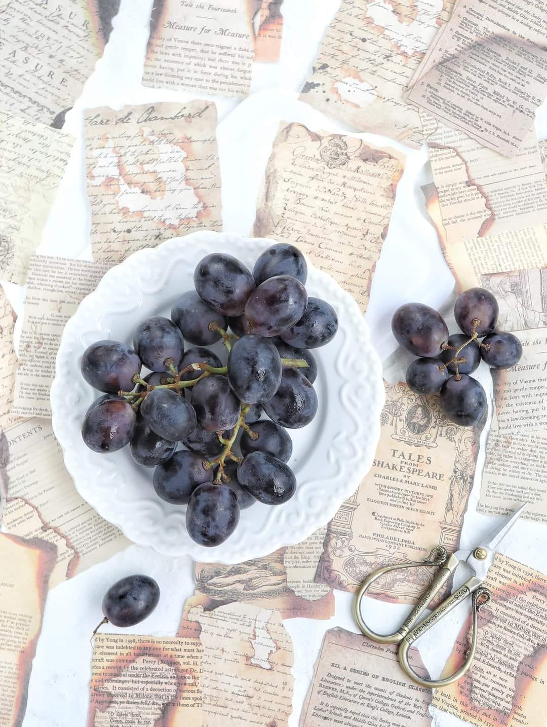 Fresh black grapes in a plate